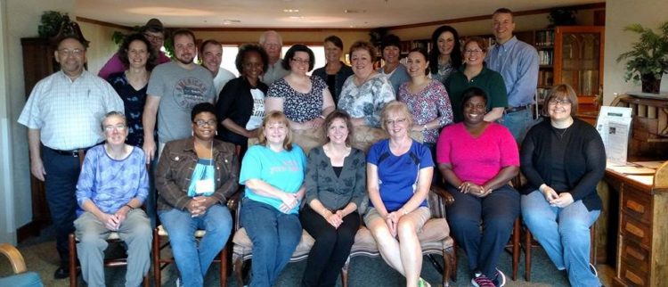 Men and women from the Nollau Institute class of 2015