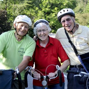 Senior citizens biking at uplands village campus
