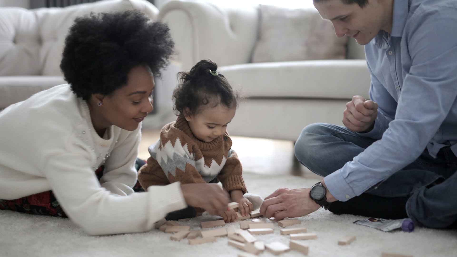 Multiracial family playing with blocks Multiracial family playing with blocks